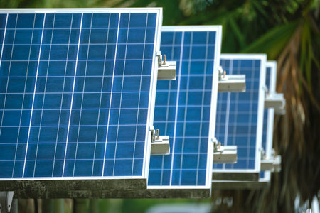 Solar panels installed on stand frame near parking lot for effective generation of clean...