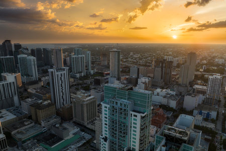 Aerial view of downtown office district of Miami Brickell in Florida, USA at sunset. High commercial and residential skyscraper buildings in modern american megapolisの写真素材