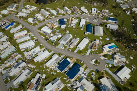 Destroyed by hurricane Ian suburban houses in Florida mobile home residential area. Consequences of...