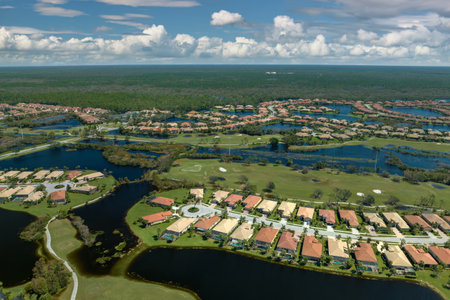 Aftermath of natural disaster. Flooded houses by hurricane Ian rainfall in Florida residential areaの写真素材