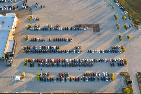 Large parking lot of local dealer with many brand new cars parked for sale. Development of american automotive industry and distribution of manufactured vehicles conceptの写真素材