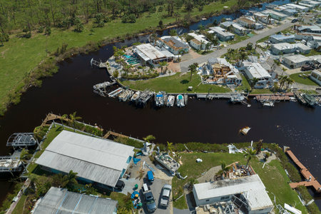 Aerial view of badly damaged mobile homes after hurricane Ian swept through residential area in...