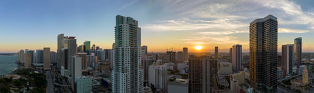 Aerial view of downtown office district of Miami Brickell in Florida, USA at sunset. High commercial...