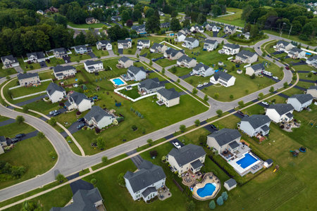 Aerial view of large private homes in Rochester, NY residential area. New family houses as example of real estate development in american suburbsの写真素材