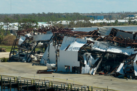 Boat station destroyed by hurricane wind in Florida coastal area. Consequences of natural disaster