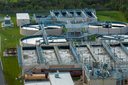 Aerial view of water treatment factory at city wastewater cleaning facility. Purification process of...