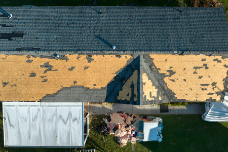 Severely damaged by hurricane Ian houses in Florida mobile home residential area. Consequences of...