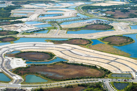 Development of residential housing in American suburbs. Beginning of construction works on prepared...
