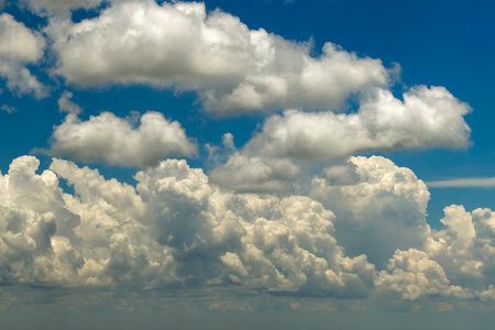 Blue sky with white clouds. Bright summer skyscape