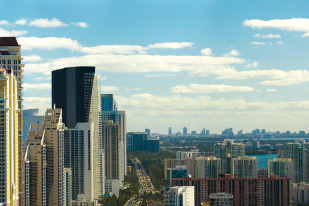 View from above of luxurious highrise hotels and condos on Atlantic ocean shore in Sunny Isles Beach...