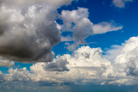 Rain clouds forming on blue Florida sky. Colorful summer skyscape