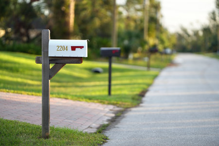 American mailbox at Florida home front yard on suburban street sideの写真素材