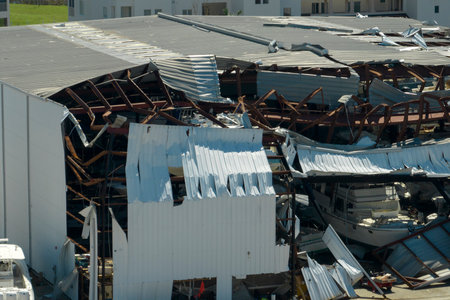 Hurricane Ian destroyed boat station in Florida coastal area. Natural disaster and its consequences
