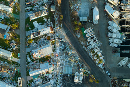 Wind damage of private houses after hurricane swept through Florida mobile home residential area....