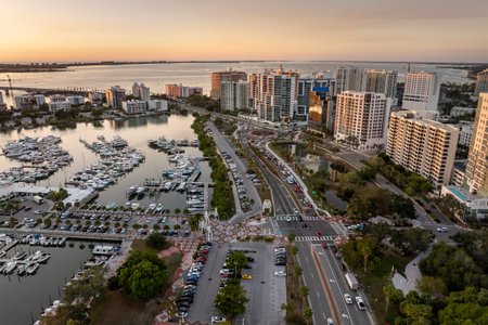 Above view of Sarasota city, Florida with yachts in bay harbor and waterfront office high-rise buildings. Development of housing and transportation in the USの写真素材