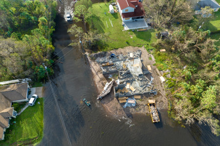 Aftermath of natural disaster. Flooded houses by hurricane rainfall in Florida residential areaの写真素材