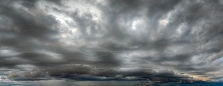 Rain shower water pouring down from stormy clouds during summer thunderstorm in Florida