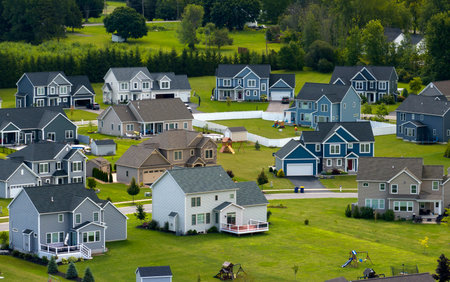 Residential homes in suburban sprawl development in Rochester, New York. Low-density two story private houses in rural suburbs. Housing market in the USAの写真素材