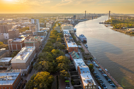 Aerial view of Savannah, old historical city in Georgia. River Street buildings architecture at nightの写真素材