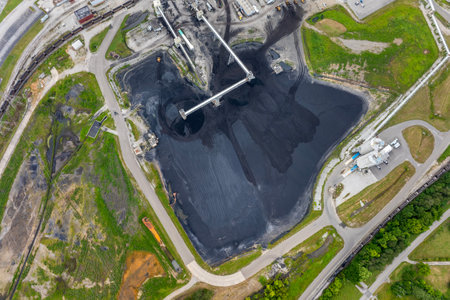 Coal stack at thermal Kingston power plant in Roane County, Tennessee. Coal used as fossil fuel for...