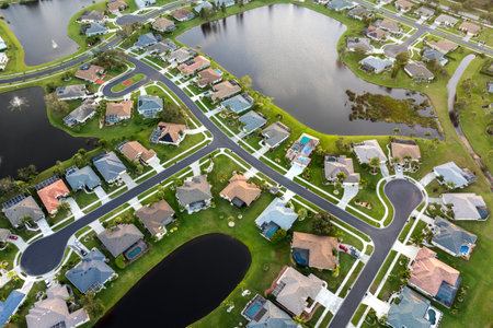 Wealthy neighborhood with expensive houses in southern Florida. Development of US premium housing marketの写真素材