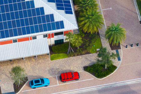 Photovoltaic panels for producing clean ecological electric energy. Florida office building with solar roof. Renewable electricity with zero emission conceptの写真素材