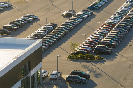 Aerial view of dealership parking lot with many brand new cars for sale. Development of american automotive industry conceptの写真素材