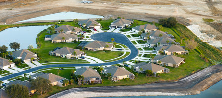 Aerial view of private homes in Florida residential area. New family houses as example of real estate development in American suburbsの写真素材
