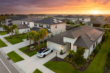 Gated community houses in rural US suburbs. View from above of large residential homes in small town in southwest Floridaの写真素材