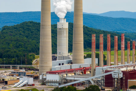 Coal-fired power plant producing electricity. Fossil fuel usage for energy productionの写真素材