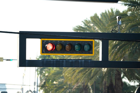 Overhead traffic lights high above street in Miami, Florida