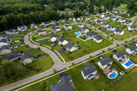 Residential homes in suburban sprawl development in Rochester, New York. Low-density two story private houses in rural suburbs. Housing market in the USAの写真素材
