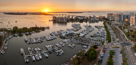 Sarasota, Florida at sunset. USA travel destination. Yachts docked in Sarasota Bay marina. American waterfront city downtown architectureの写真素材