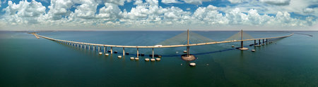 Sunshine Skyway Bridge over Tampa Bay in Florida with moving traffic. Concept of transportation infrastructureの写真素材