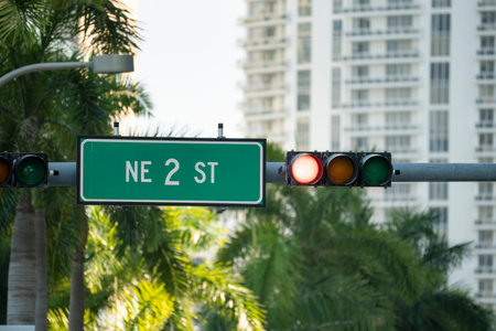 Traffic lights for traffic regulation high above street in Miami, Floridaの写真素材