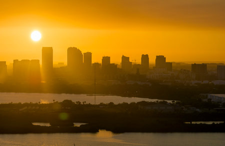 View from above of contemporary high skyscraper buildings in downtown district of Tampa city in Florida, USA at sunset. American megapolis with business financial districtの写真素材