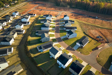 View from above of densely built residential houses in living area in South Carolina. American dream homes as example of real estate development in US suburbsの写真素材