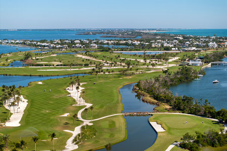 Waterfront golf course in Florida. Sports grounds with green grass in Boca Grande, small town on Gasparilla Islandの写真素材
