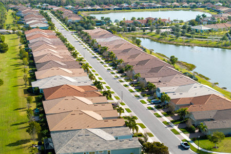 Wealthy residential area in USA suburbs. Rich neighborhood with expensive suburban homes in southwest Floridaの写真素材