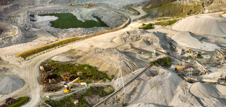 Aerial view of open pit mining site of limestone materials extraction for construction industry.の写真素材
