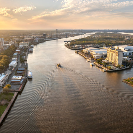 Aerial view of River Street in Savannah, Georgia. American city old historical architecture. USA panoramic cityscape at nightの写真素材
