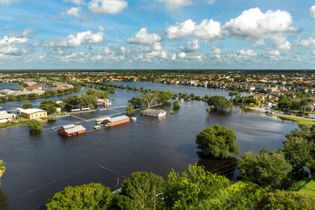 Hurricane Debby tropical rainstorm flooded farm homes in suburban area in Sarasota, Florida. Aftermath of natural disasterの写真素材