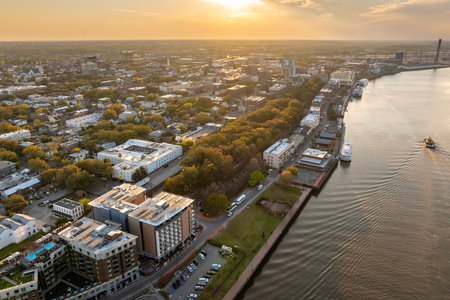 Panoramic cityscape with River Street old historical architecture in Savannah, Georgia. Southern American architecture in eveningの写真素材