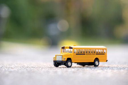 Toy american yellow school bus as symbol of education in the USAの写真素材