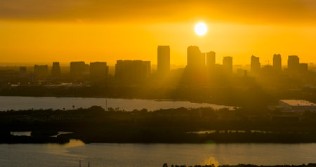 View from above of contemporary high skyscraper buildings in downtown district of Tampa city in Florida, USA at sunset. American megapolis with business financial districtの写真素材