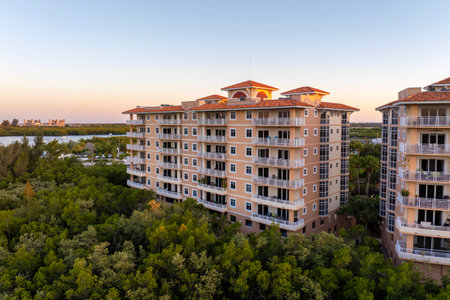 Aerial view of American apartment building in Florida residential area. New family condos as example of housing development in US suburbsの写真素材