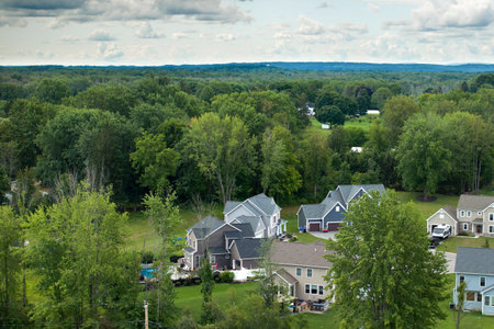 Aerial view of spacious new family houses in upstate New York suburban area. Real estate development in american suburbsの写真素材