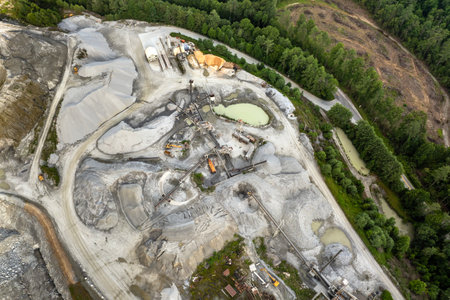 Sand open-pit mining quarry with processing plant for crushed stone. Extracting of natural resources for construction industryの写真素材