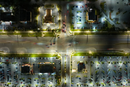 Traffic rush at shopping malls and small businesses in evening time in North Port, Florida. USA transportation and retail infrastructure conceptの写真素材