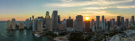 Aerial view of downtown district of of Miami Brickell in Florida, USA at sunset. High commercial and residential skyscraper buildings in modern american megapolisの写真素材
